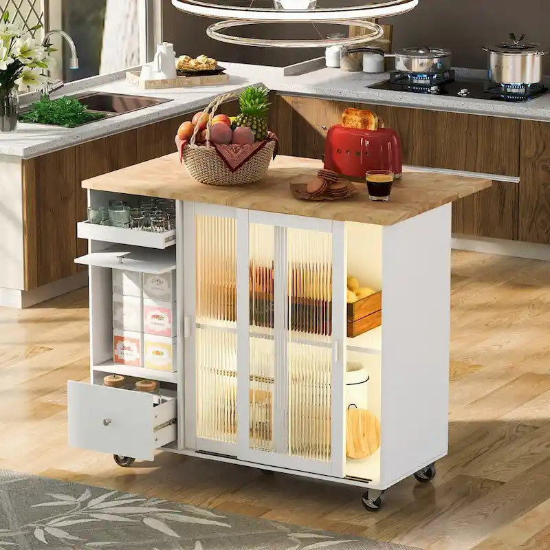 Îlot de cuisine mobile avec plateau rabattable, éclairage LED, portes en verre cannelé, étagère réglable et deux tiroirs